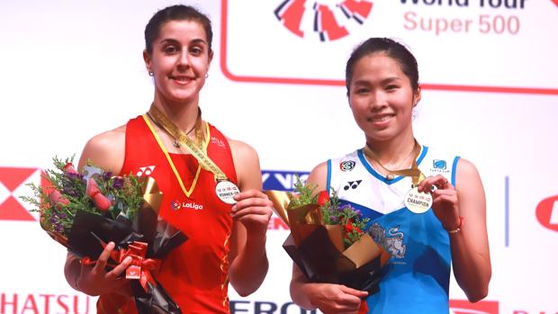 Marín e Intanon posan tras la final