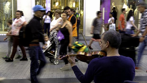 Músicos callejeros en la calle Preciados de Madrid